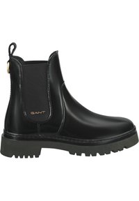 Schwarze Chelsea-Stiefel mit glänzender Oberfläche, elastischen Seitenelementen und einer strukturierten Gummisohle. Mit einem goldenen Logo-Akzent.