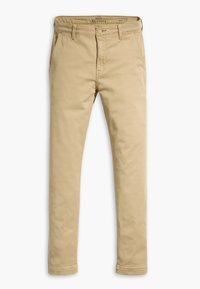 Pantalon chino beige slim tapered avec passants de ceinture, poches avant, fermeture par bouton et fermeture éclair, taille W32 L32, étalé à plat sur un fond blanc.