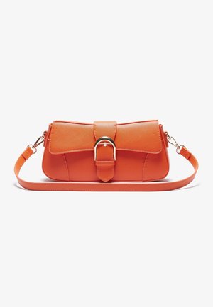 Orange handbag with a smooth texture, featuring a flap closure, a metallic buckle accent, and a detachable shoulder strap.
