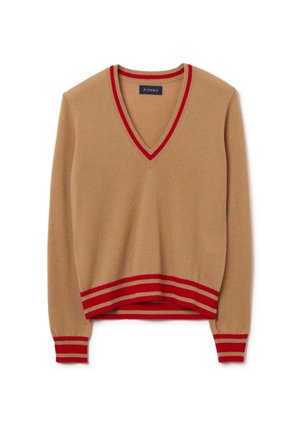 Beiger V-Ausschnitt-Pullover mit rot-weißen gestreiften Rippbündchen an Kragen und Saum. Weicher Stoff mit langen Ärmeln und modernem Schnitt.