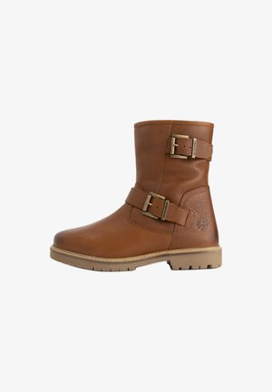 Brown leather mid-calf boot with two adjustable buckle straps and a rubber lug sole, shown in profile on a white background.