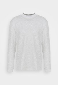 Graues Langarmshirt mit hohem Kragen. Hergestellt aus einem leichten, strukturierten Stoff mit gerippten Bündchen. Einfaches und minimalistisches Design.