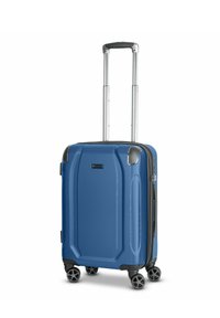 Maleta rígida azul con superficie texturizada, asa plateada retráctil, cuatro ruedas negras y cierre de cremallera.