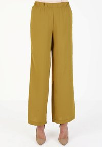 Wide-leg pants in mustard yellow, featuring an elastic waistband, smooth texture, and a full-length design with no pockets.
