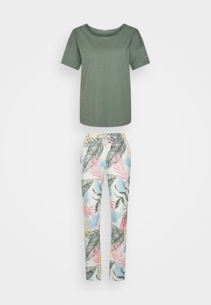 Olive green short-sleeve T-shirt with a round neckline paired with white pants featuring a floral print in pink, blue, and green tones.