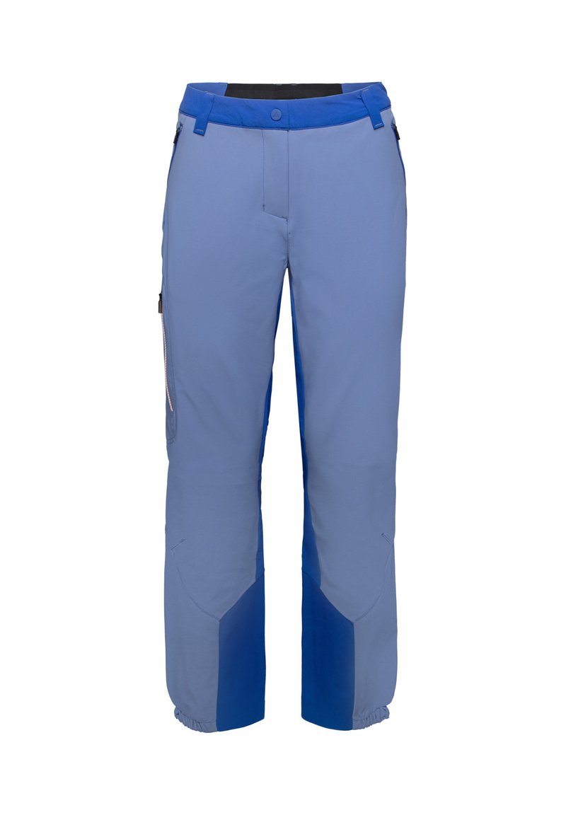 Ljust blå skidbyxor med mörkblå accenter. Har en rak passform, justerbar midja och dragkedjefickor på sidorna. Förstärkta knäområden.