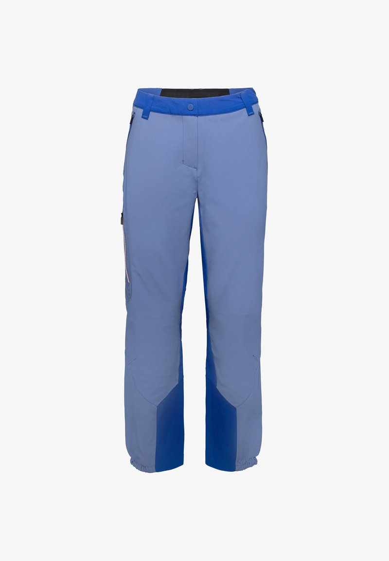 Ljust blå skidbyxor med mörkblå accenter. Har en rak passform, justerbar midja och dragkedjefickor på sidorna. Förstärkta knäområden.