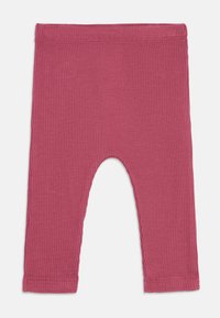 Ribbestrikkede leggings i dyp rose med elastisk midjebånd, som har en rund utskjæring i bunnen og glatt, teksturert stoff gjennomgående.