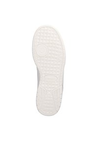 Suola di sneaker bianca con una superficie in gomma testurizzata, caratterizzata da un motivo circolare e un logo del marchio al centro.