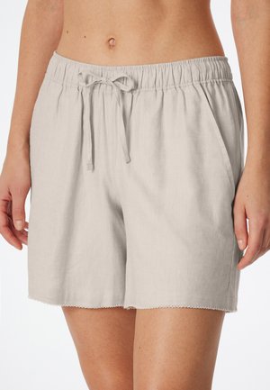 Lichtgrijze katoenen shorts met een elastische tailleband en een trekkoorddetail. Heeft een gegolfde zoom en een ontspannen fit voor comfort.