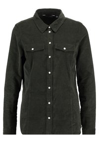 Mörkgrön kordskjorta med knapp-fram, spetsig krage och två bröstfickor. Har vita knappar och en texturerad tyg.