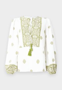 Hvit bluse med grønn blomsterbroderi, en nøkkelhulls-halslinje med dusk og innsamlede lange ermer med matchende mansjetter.