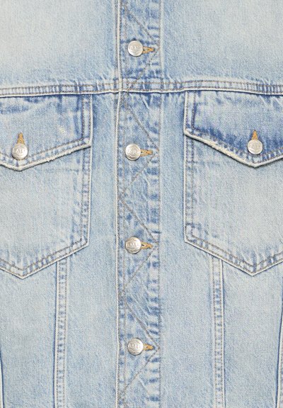 Light blue denim jacket front with two flap chest pockets and silver buttons embossed with "BALR."