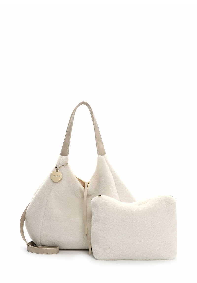 Pehmeä kermaisenvalkoinen tekoturkishandbag, jossa on löysä muoto, nahkaremmi ja irrotettava pussi. Sujuva pinta ja minimalistischinen muotoilu.