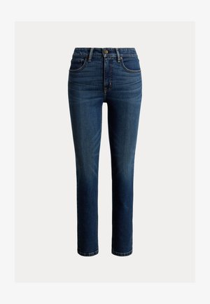 Σκούρα μπλε τζιν με στενή γραμμή, μέτρια μέση, σχεδιασμό με πέντε τσέπες και διακριτικές γραμμώσεις μπροστά για επιπλέον υφή.