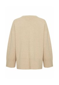 Pull oversized beige avec un col rond, des épaules tombantes et un ourlet droit. Présente une texture minimaliste et douce sans motifs.