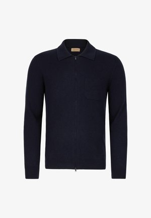 Marinblå ullkofta med dragkedja, vikkrage och bröstficka till vänster. Slät textur och figursydd design med långa ärmar.