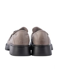 Leather shoes in light gray with a black rubber sole, featuring a rounded back and simple stitching details.