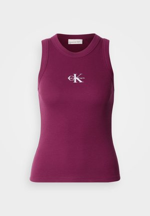 Ribbed, sleeveless tank top in dark purple with a crew neck and white "Calvin Klein" logo on the chest. Soft fabric with a fitted design.