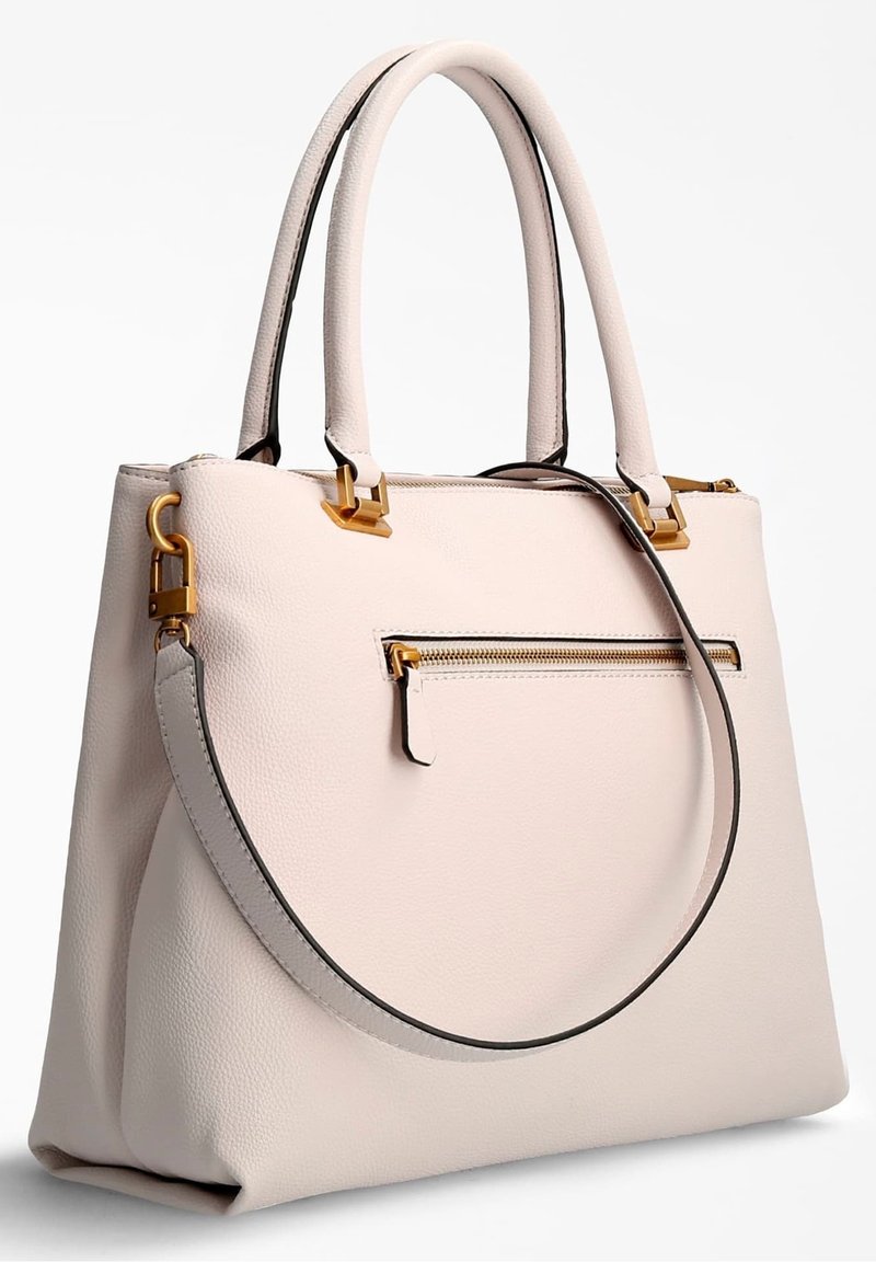 Sac à main en cuir beige clair avec double poignées, bandoulière amovible et poche avant zippée avec accents en métal doré.