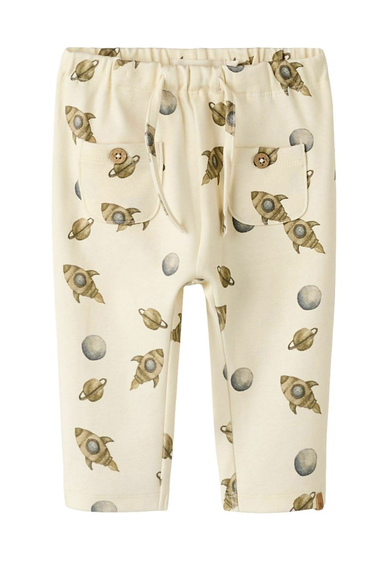 Beżowe spodnie z nadrukiem rakiety i planety. Wykonane z bawełny, z dwiema kieszeniami, elastycznym pasem i sznurkiem do regulacji.