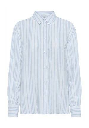 Šviesiai mėlynas marškinis su vertikaliomis baltomis juostelėmis, ilgomis rankovėmis ir smailiu apykakle. Yra mygtukų rankogaliai ir laisvas siluetas.