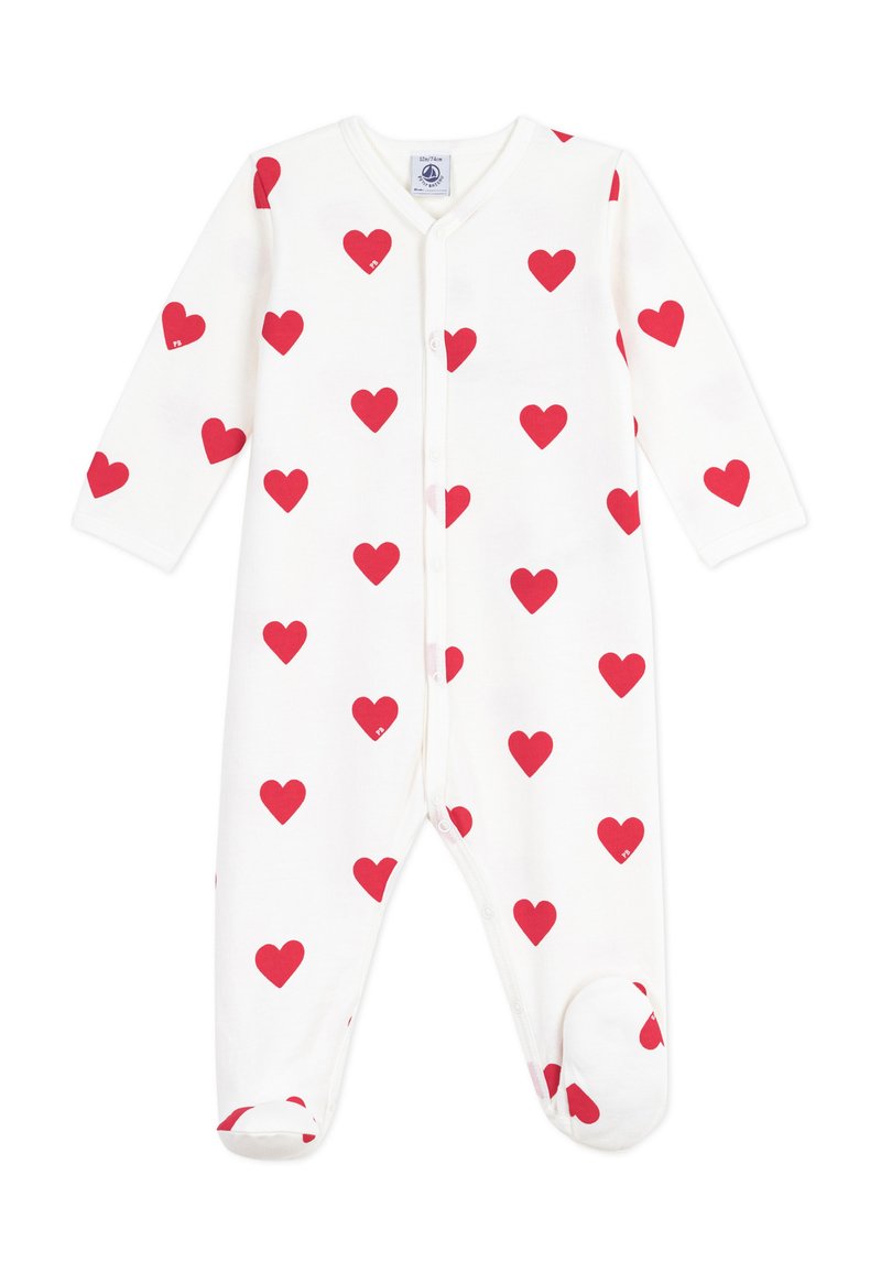 Body in cotone bianco con maniche lunghe, caratterizzato da un motivo a cuori rosse, bottoni a pressione sul davanti e design con piedi per garantire calore.