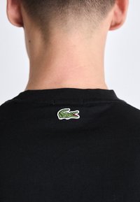 Lacoste UNISEX - Marškinėliai su spaudiniu - black