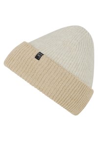 Beige and cream ribbed knit beanie with folded cuff and small black fabric tag on cuff.