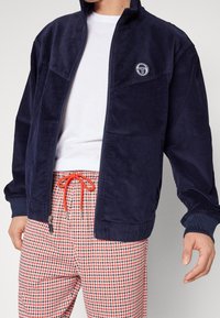 Sergio Tacchini Lehká bunda - blue