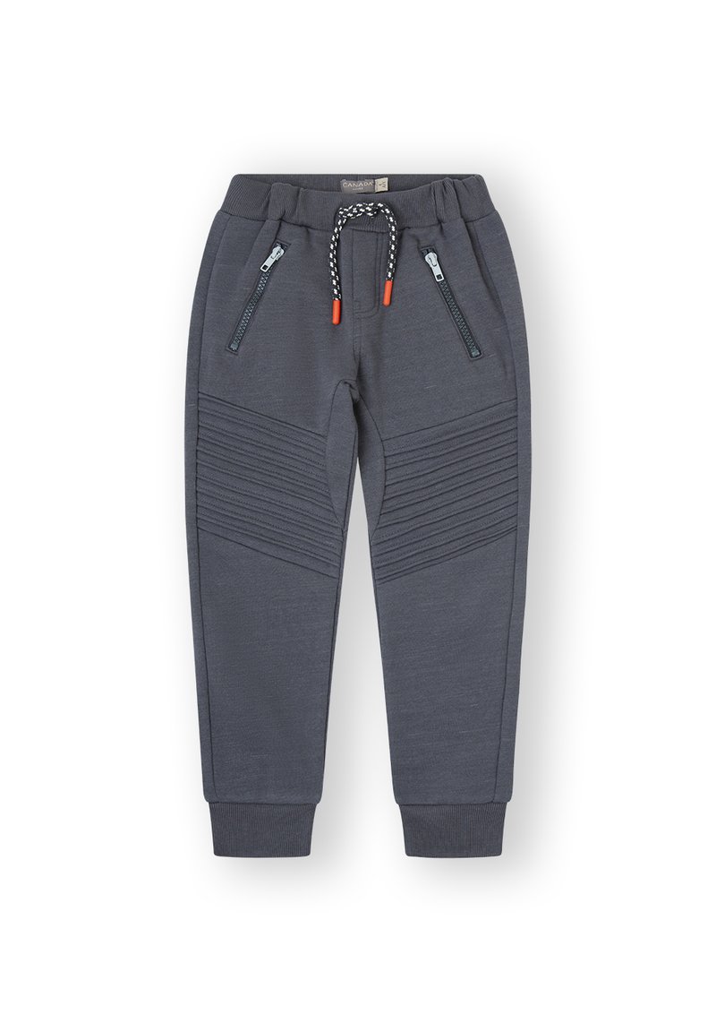 Pantalones de chándal grises con textura acanalada en las rodillas, dos bolsillos con cremallera y una cintura con cordón de ajuste con detalles en color naranja.