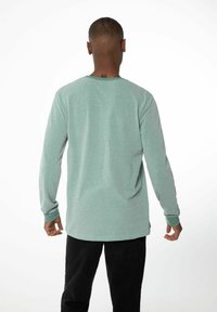 NXG by Protest NXGQUILLAN - Sweatshirt - arcticgreen