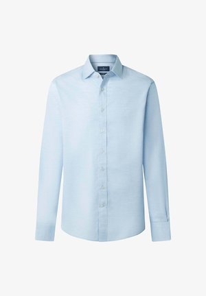 Lyseblå langærmet skjorte lavet af et glat stof, med knaplukning foran, krave og et lille logo på venstre bryst.