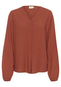 Langærmet bluse i rustfarve med et tekstureret prikket mønster og V-hals. Har elastiske manchetter og en løs pasform.