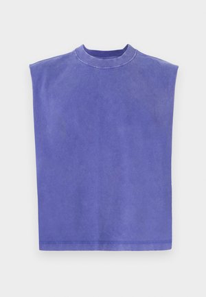 Purple sleeveless top made of soft cotton. Features a round neck and a relaxed fit, with a slightly faded texture and clean hem.