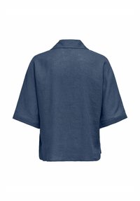 Camicia in lino blu navy a maniche corte con colletto, vestibilità rilassata e orlo leggermente arrotondato, che presenta un materiale leggero e con texture.