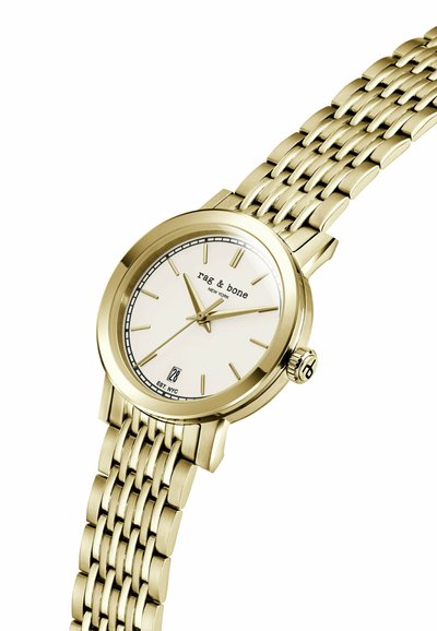 Ceas analog cu carcasă aurie, cadran alb, marcaje aurii, fereastră pentru data la ora 6 și brățară metalică legată.