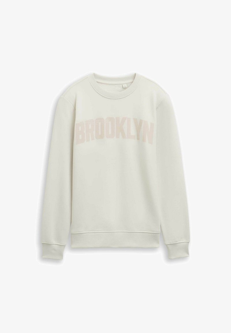 Felpa in crema chiaro con girocollo e maniche lunghe. "BROOKLYN" stampato in un rosa tenue sul petto. Texture liscia, polsini a costine.
