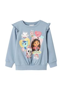 Gaiši zils džemperis ar volāna aksentiem uz pleciem, rotāts ar krāsainiem varoņu attēliem un spēlējamu tekstu. Izgatavots no mīksta auduma ar brīvu piegriezumu.