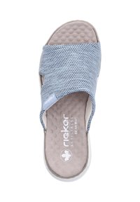 Light blue slip-on sandal with mesh upper, textured beige insole, and white sole. Features brand logo and "extra wide" labeling.