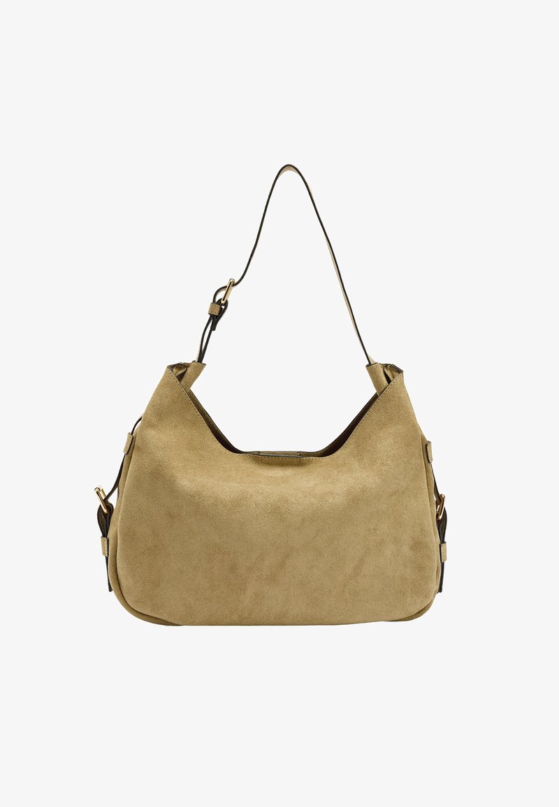 Torba hobo wykonana z beżowego zamszu o zakrzywionym kształcie. Posiada jeden pasek na ramię oraz złote akcenty. Gładka tekstura.