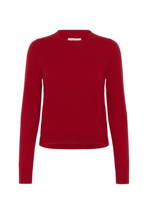 Punane kudum särk pikkade varrukatega, ümmarguse kaelusega ja sobiva, lühikese disainiga. Valmistatud pehmest kangast, millel on sile tekstuur.