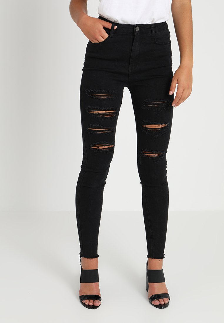 high waisted extreme ripped skinny jeans