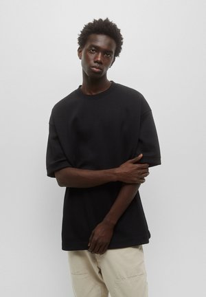 PLUSH - T-shirt - bas - black