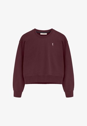 Burgunderfarvet cropped sweatshirt lavet af glat stof med rund hals, ribbede manchetter, og et lille broderet logo på brystet.