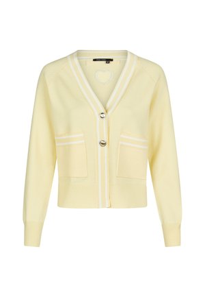 Light yellow cropped cardigan with white striped trim, two front pockets, long sleeves, and two silver buttons down the front.