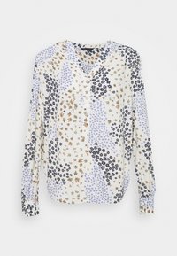 Blusa a maniche lunghe con motivo floreale in crema, caratterizzata da diversi disegni di fiori blu, neri e marroni, con scollatura a V e chiusura con bottone.