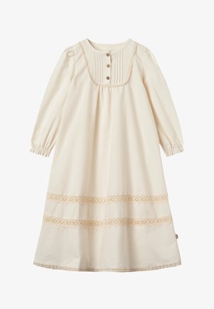 Kreminės spalvos ilgomis rankovėmis suknelė su nėrinių apdaila ant krūtinės ir apačioje, trys mygtukai priekyje ant įkirpimo, surinktos rankogaliai.