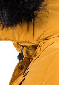 Yellow padded jacket with a black faux fur hood. Features a front zipper and snap buttons, textured fabric, and adjustable drawstring.