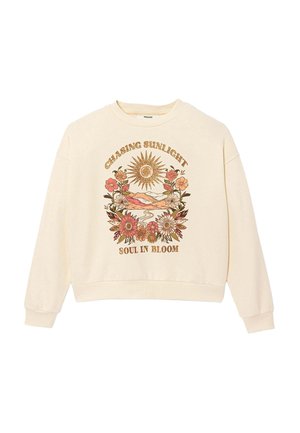 Sweat-shirt crème à manches longues avec graphisme floral et soleil, montagnes, et texte « Chasing Sunlight » et « Soul in Bloom » sur le devant.